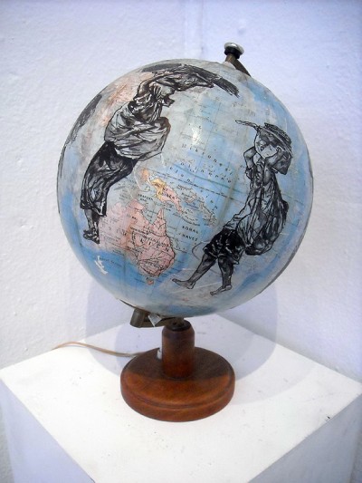 Weight of the World (view 1) (2010) Armsrock Denmark Ink & graphite on paper affixed to anique globe Globe is 10 inches in diameter 12 x 16" 30 x 41 cm 